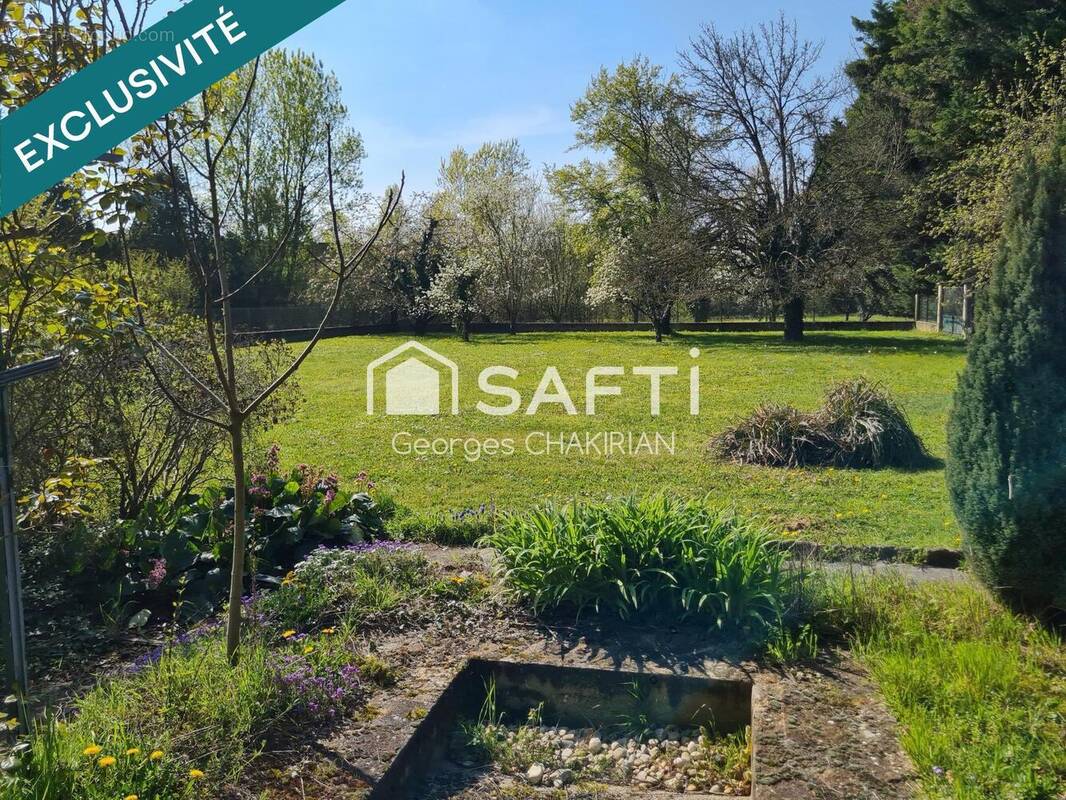 Photo 1 - Maison à DECINES-CHARPIEU