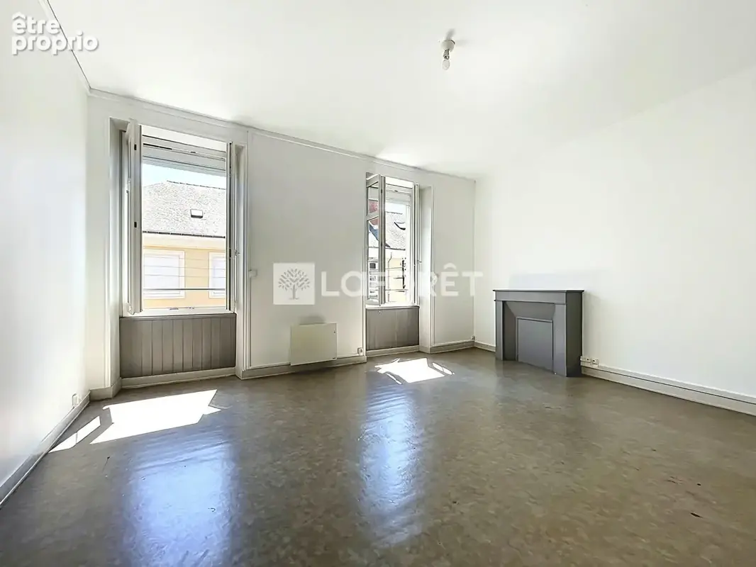 A deux pas de la gare et de la Place de la Visitation T3 de 65m² - photo 2