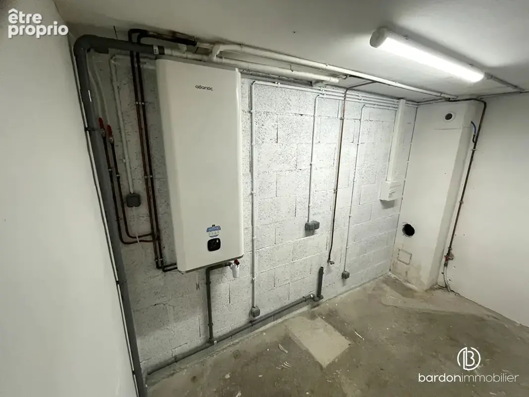 Appartement T4 - 96m² avec jardin privatif + 2 places de stationnement - photo 8