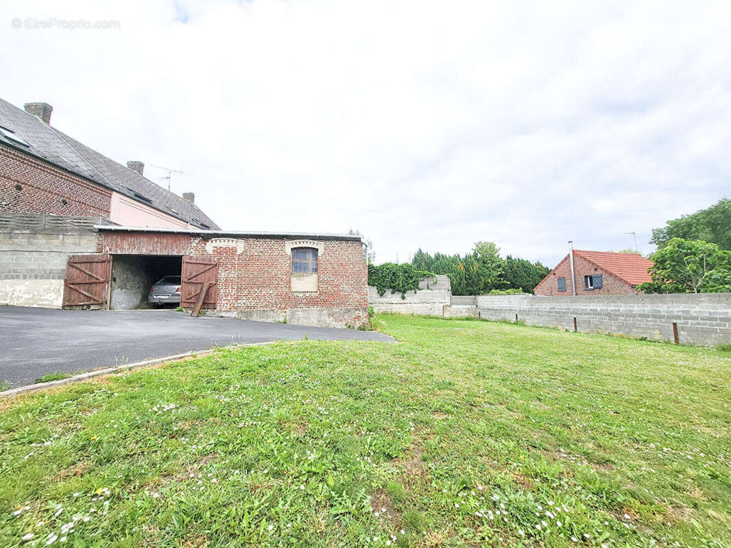 Axe CAUDRY CAMBRAI Maison de village bon état - photo 2