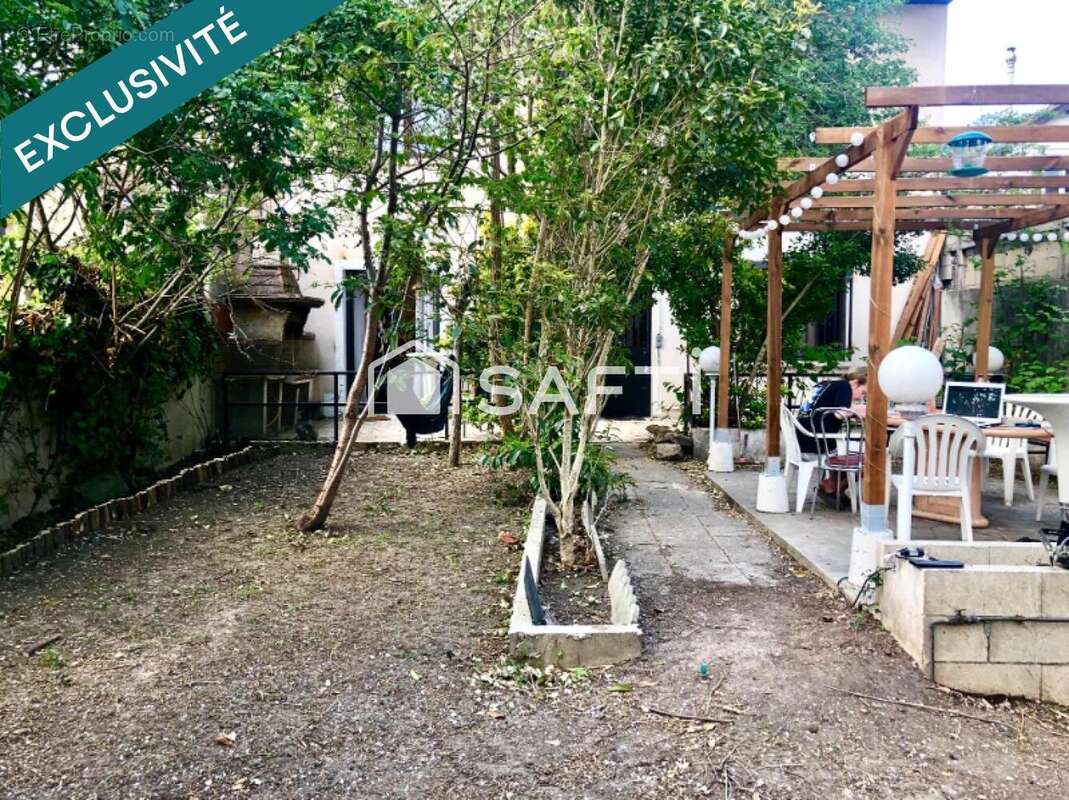 Photo 2 - Maison à AUBERVILLIERS