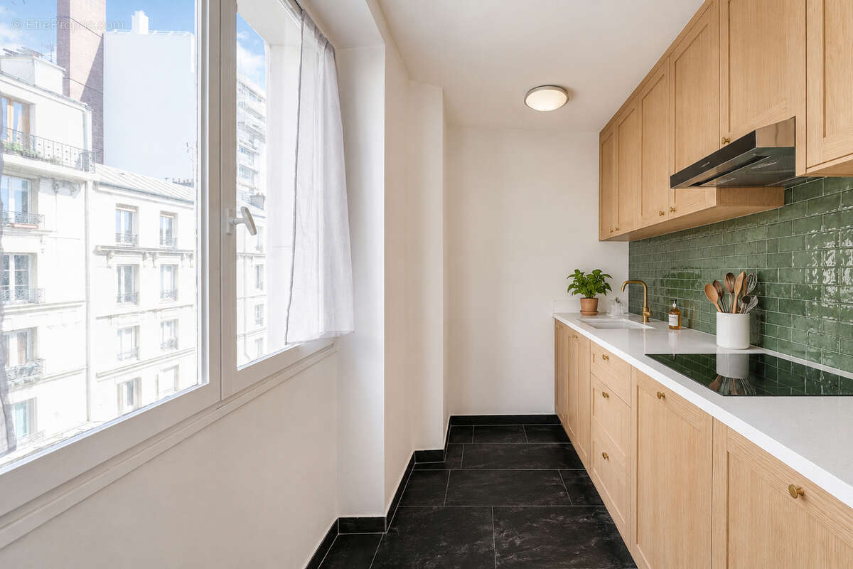 Appartement Paris 2 pièce(s) 36 m2 - photo 2