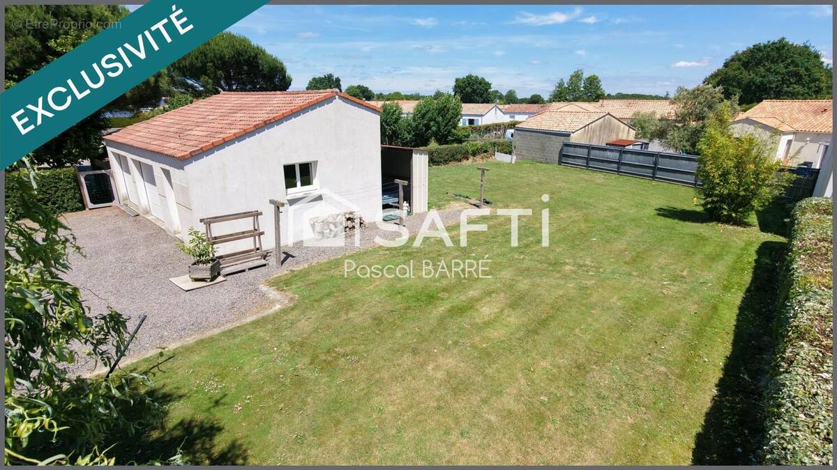 Photo 1 - Terrain à SAINT-JULIEN-DES-LANDES