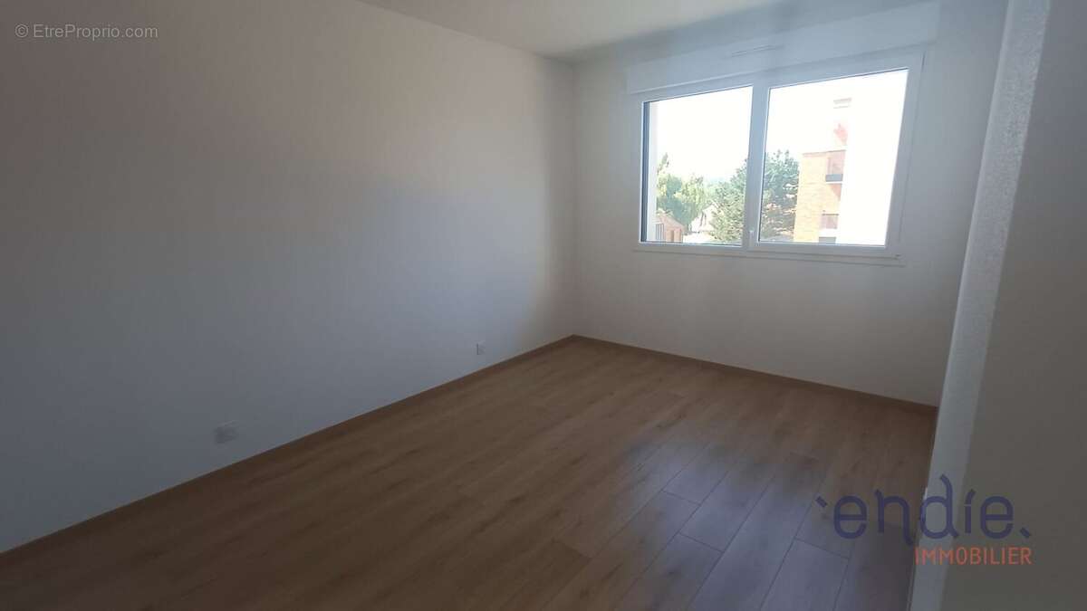 À 8 minutes de Sierentz  Superbe appartement 3 pièces avec terrasse et jardin privatif - photo 11