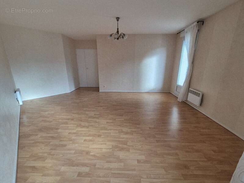 Appartement T3, cave et une place parking - photo 4