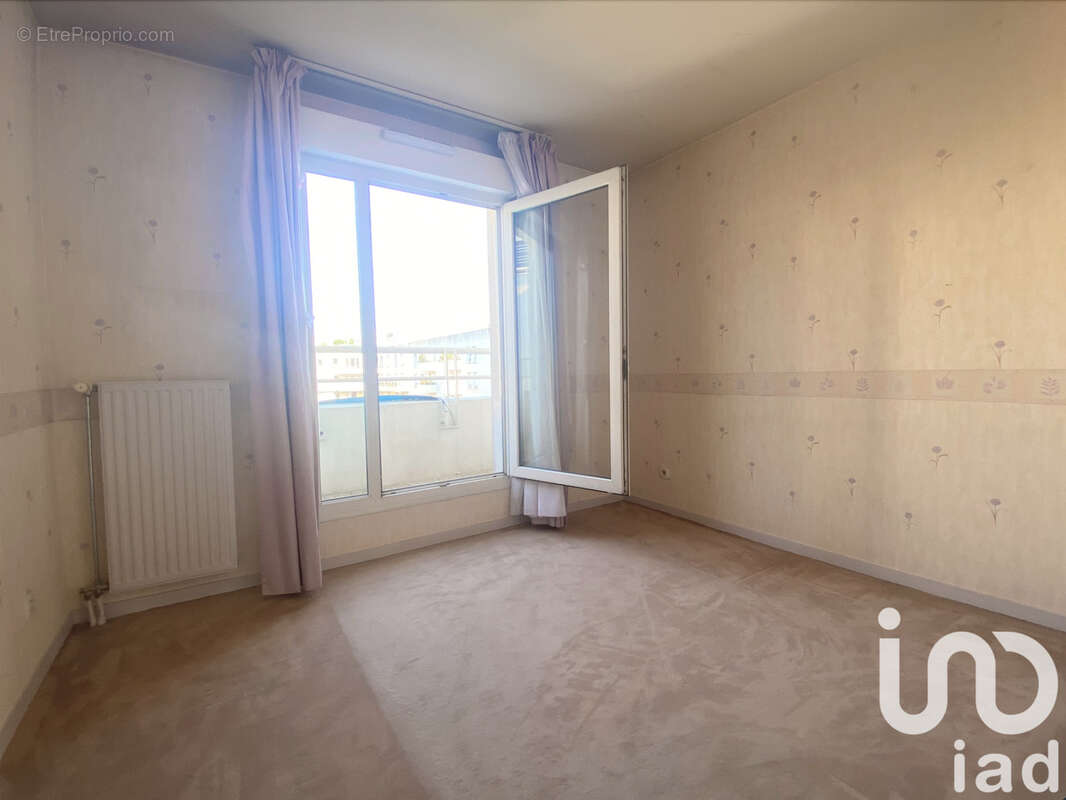 Photo 9 - Appartement à COURBEVOIE