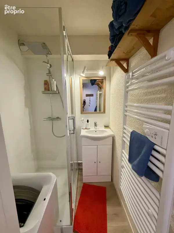Dans une résidence au pied des pistes de ski et des commerces, venez découvrir ce bel appartement de 34m2, - photo 8