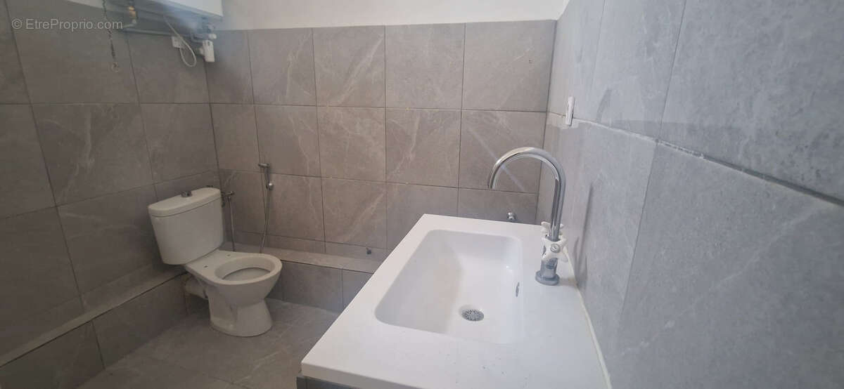 Appartement T4 divisible de 72 m2 + balcon - photo 11