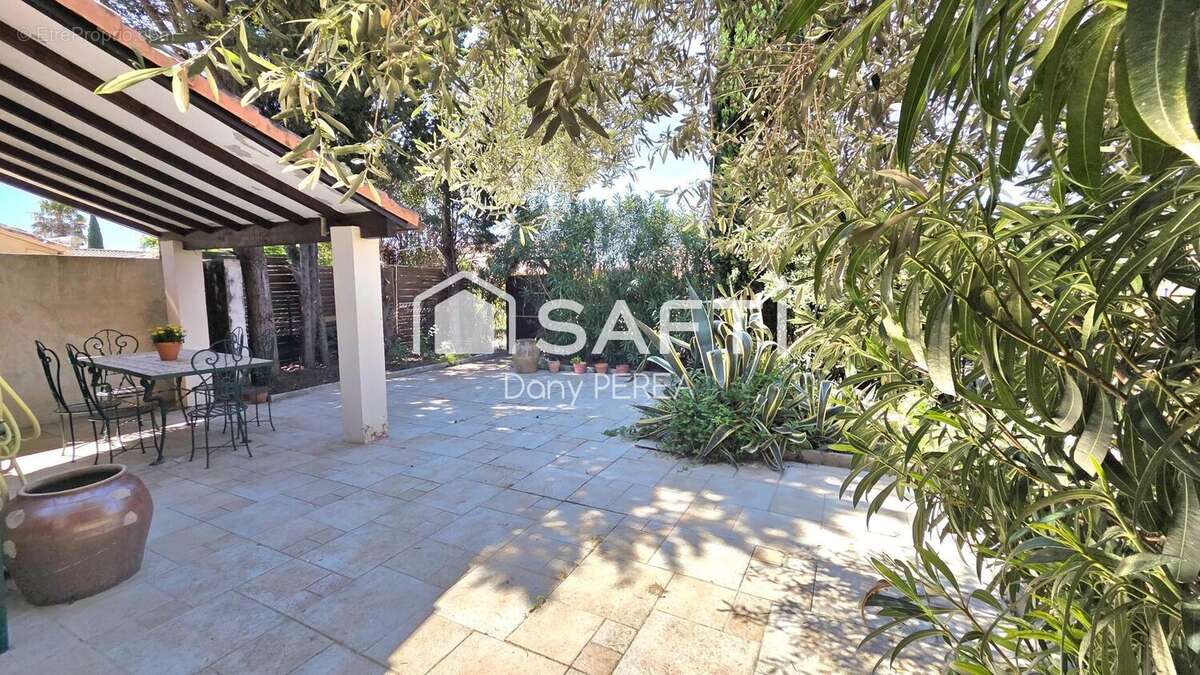 Photo 3 - Maison à SAINT-LAURENT-D'AIGOUZE