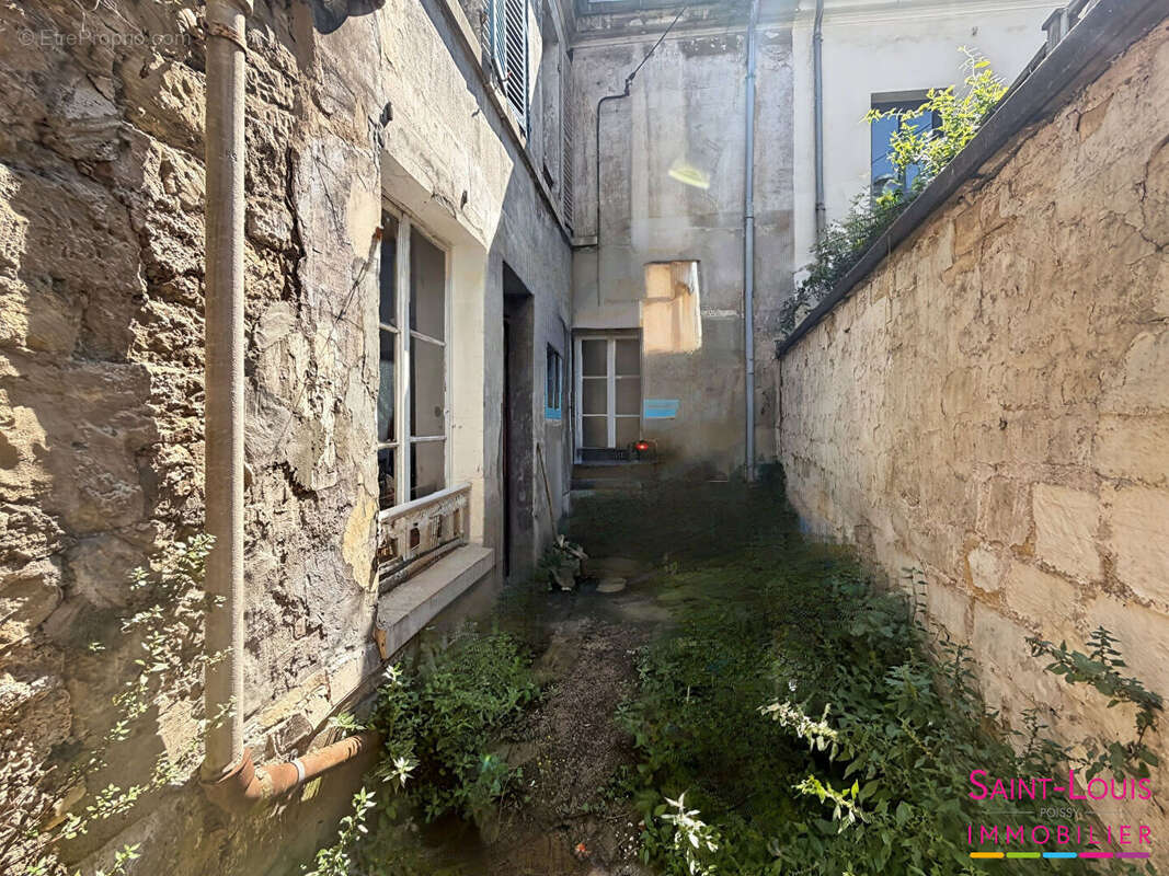 Poissy - Centre ville - Maison de caractère du XIX siècle - photo 11