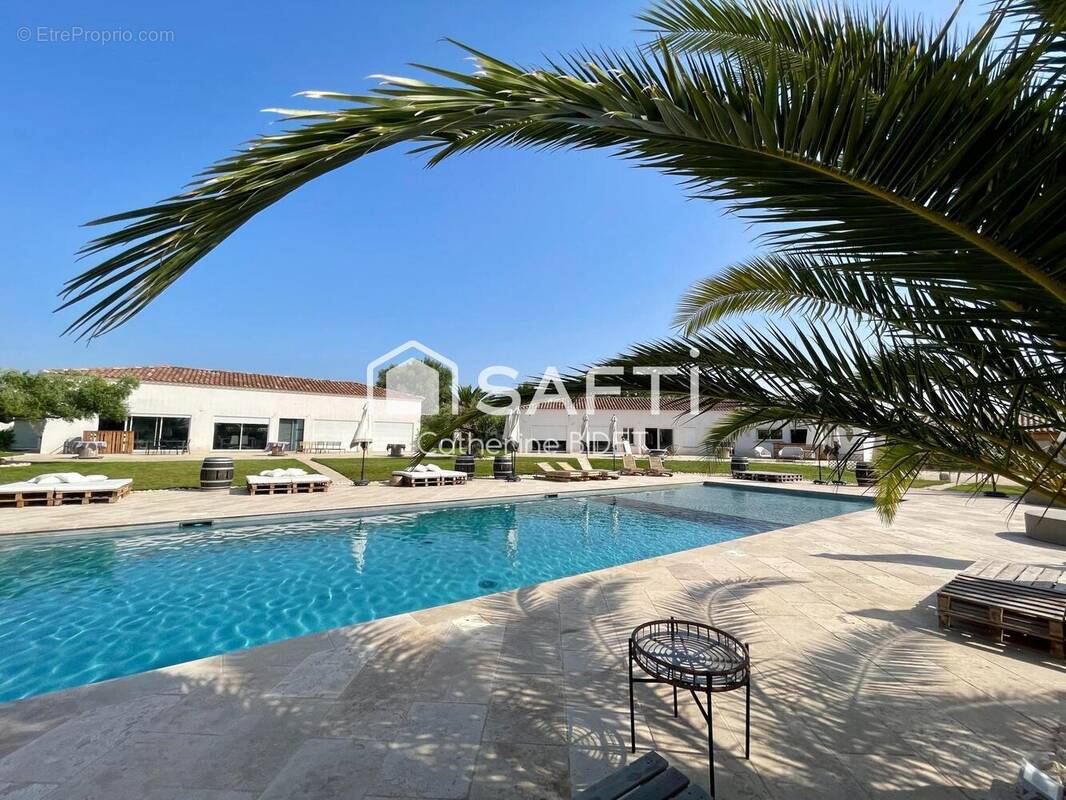 Photo 1 - Maison à AIMARGUES