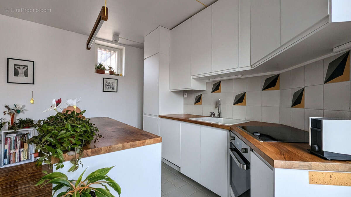 Appartement Saint Denis 2 pièce(s) 50.28 m2 - photo 4