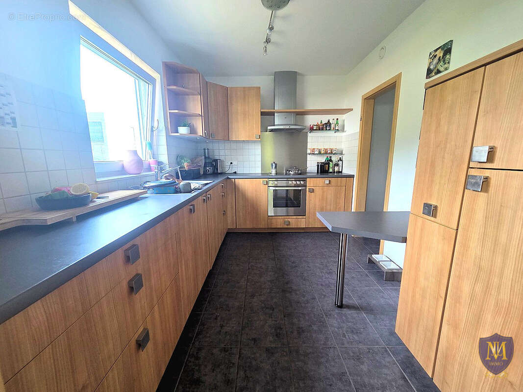Blotzheim très au calme belle maison 6 pièces de 125 m2 sur 7,91 ares - photo 6