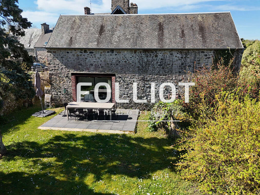 Maison à AGON-COUTAINVILLE