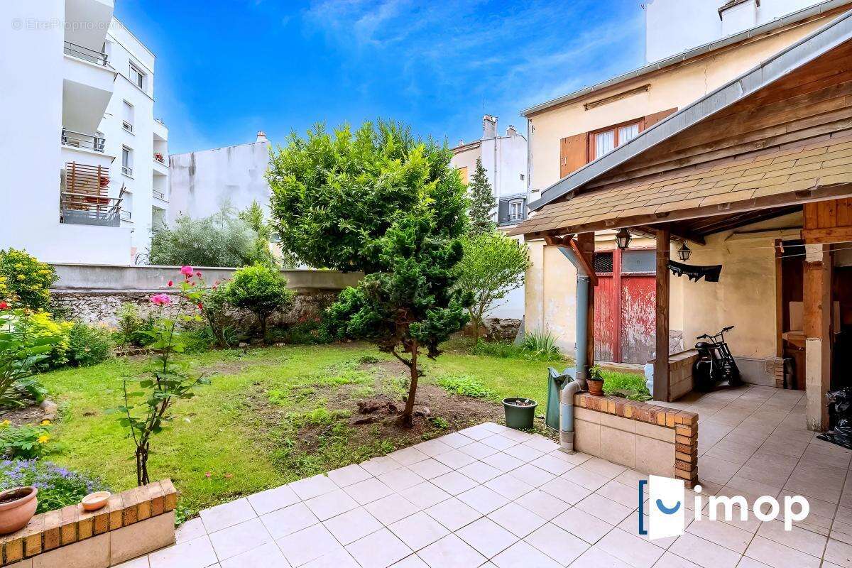 Immeuble de 2 duplex avec jardin à 2 min du Métro 13 Porte de Paris - photo 2