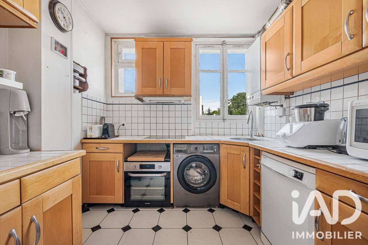 Photo 5 - Appartement à COURBEVOIE