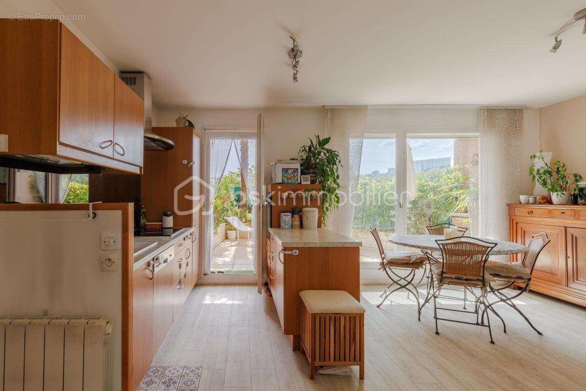Charmant T3 de 58 m² + 2 terrasses arborées situé en bord de Saône, au sein d'une résidence boisée - photo 5