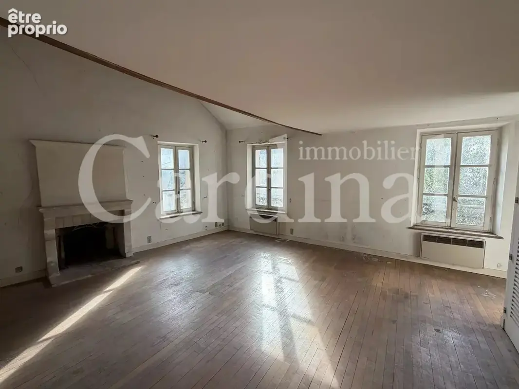 Une maison de charme à réinventer au cœur du village - photo 4