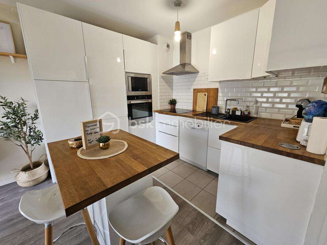 Appartement F2 44m² à 300m du RER DPE C balcon OUEST parking - photo 8