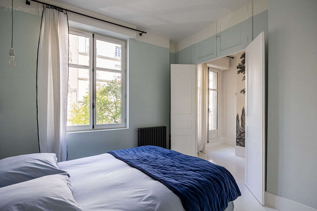 Appartement de prestige 134 m² dans un immeuble de caractère avec ascenseur et parking. - photo 14