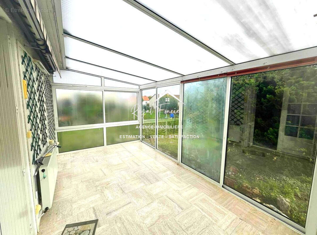 Véranda  - Maison à LES ORMES