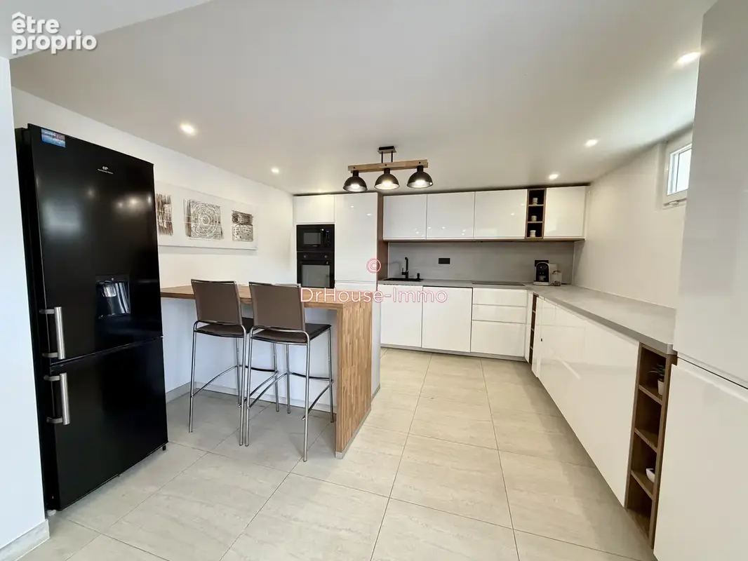Maison 8 pièces 145 m² à vendre à Amilly (45200) - photo 2