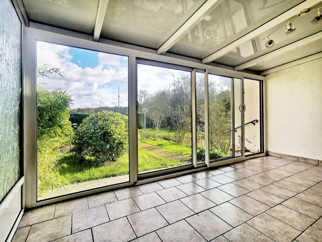 MAISON INDIVIDUELLE DE PLAIN-PIED avec sous-sol total sur 1000m2 de terrain arboré - photo 3