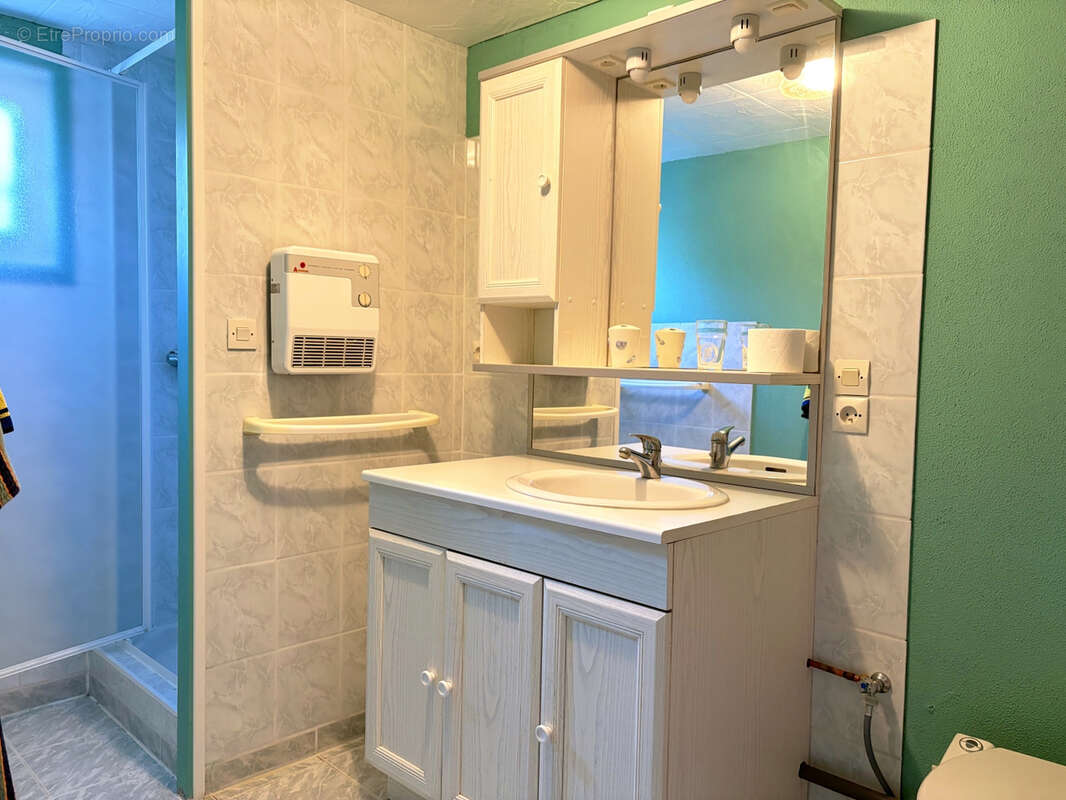 Maison à TOUR-EN-BESSIN