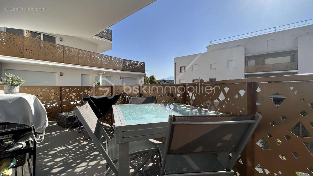 T2 récent 43 m² avec balcon 9,4 m² + parking sous-sol - photo 2