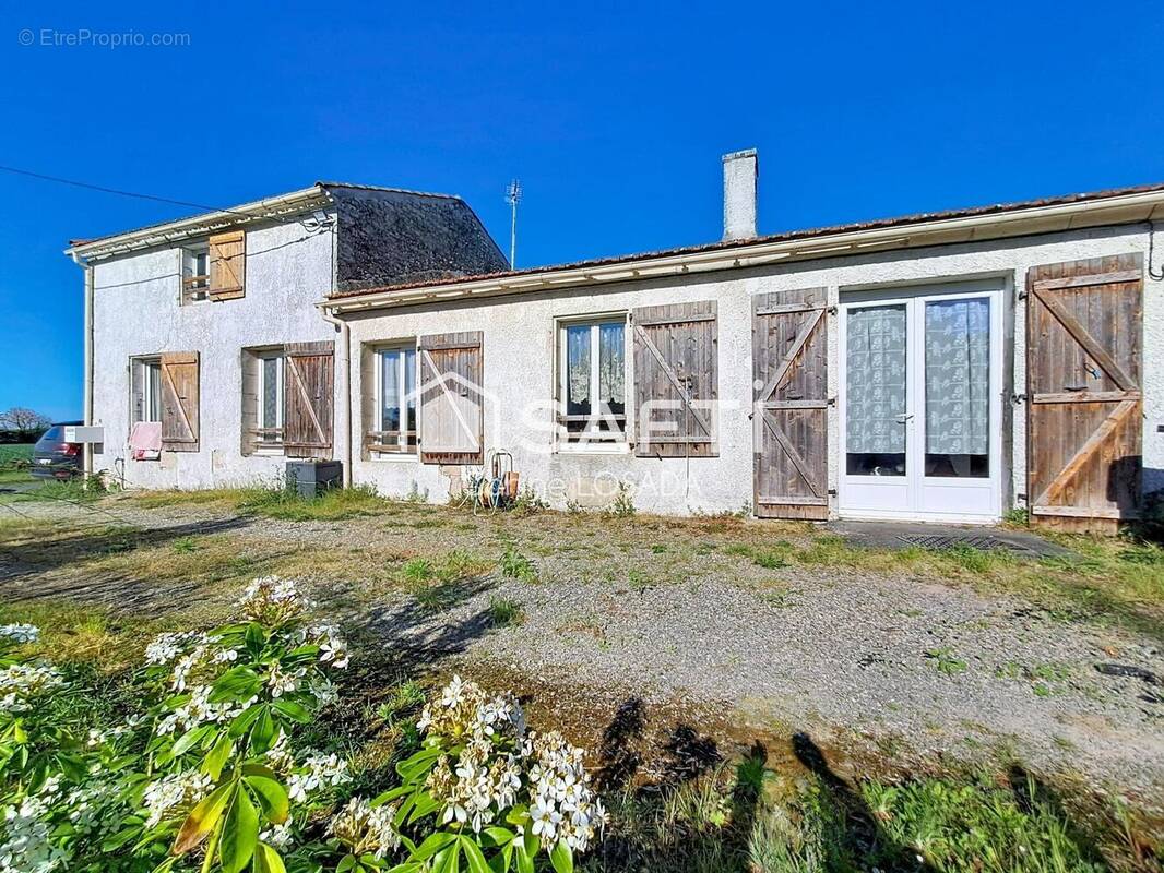 Photo 1 - Maison à LES MAGNILS-REIGNIERS