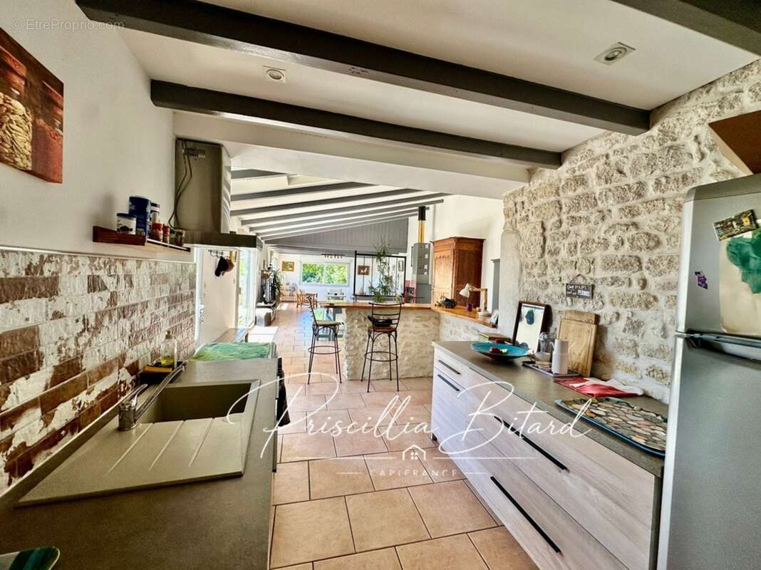 Le charme d'un environnement verdoyant allié au confort d'une maison familiale - photo 13
