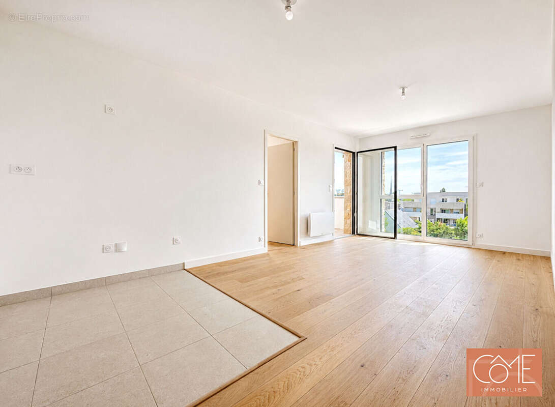 Grand type 2 48,33m² - balcon - avant dernier etage - parking sous-sol - centre-ville - saint-grégoire - photo 2