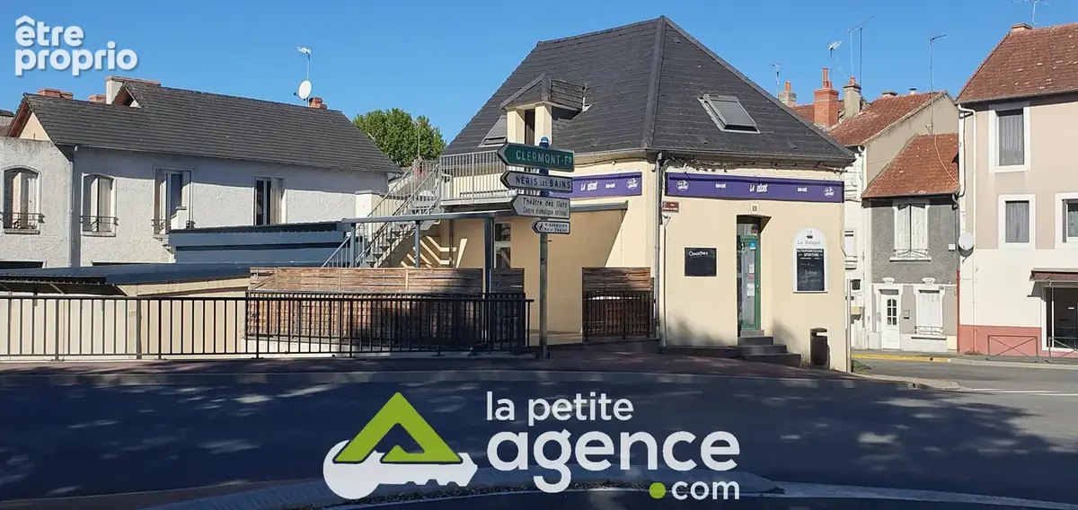 Immeuble de rapport avec local commercial bien situé - photo 3