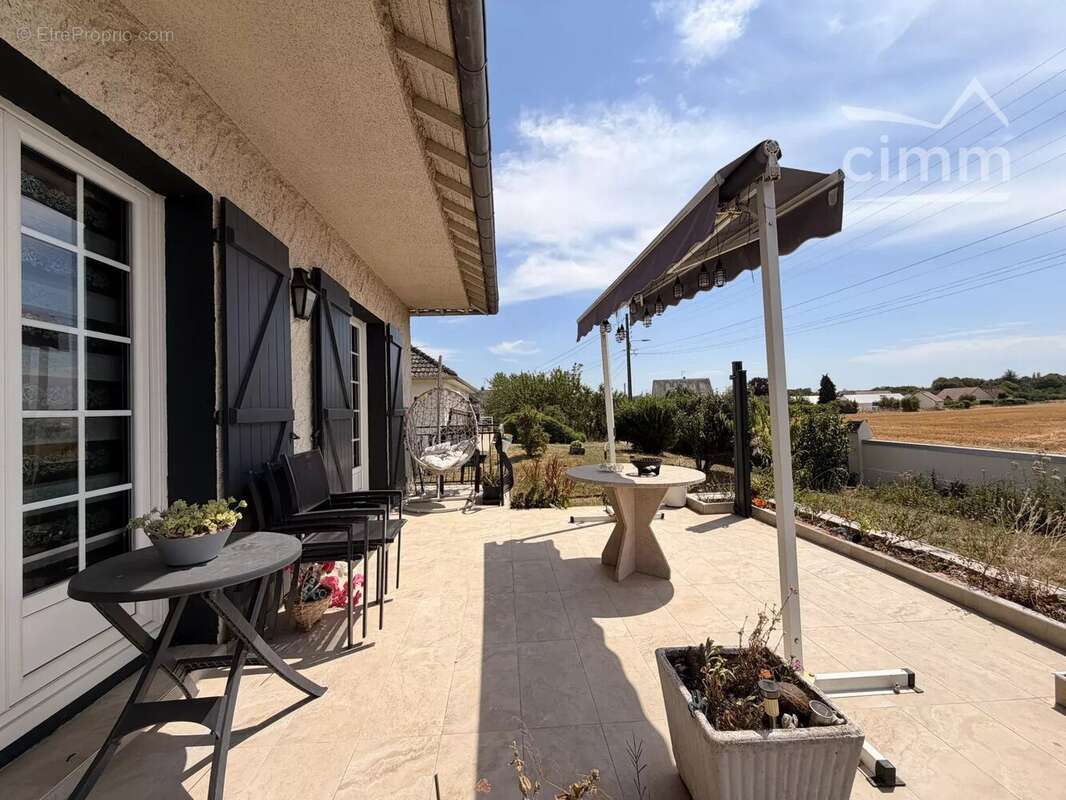 MER – Maison sur sous-sol complet de 130 m² – 4 chambres – Terrain de 970 m² avec vue dégagée sur les champs - photo 15