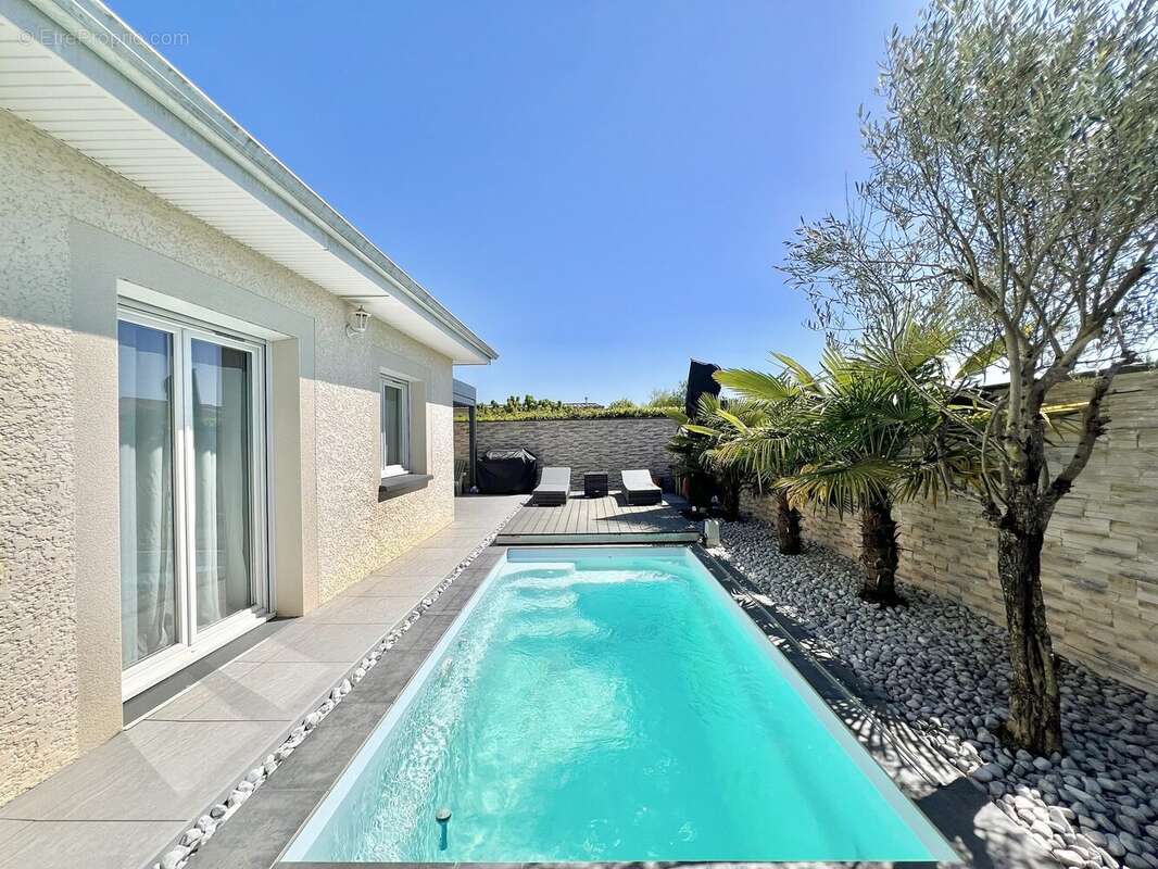 Maison 111 m² à Tignieu-Jameyzieu  - photo 2