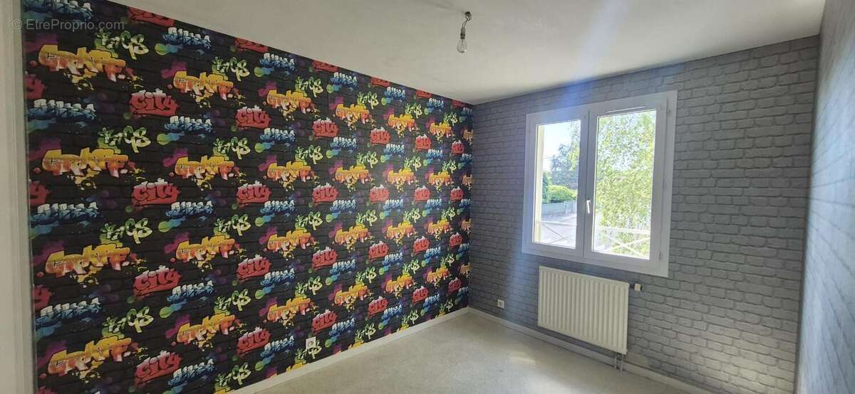 Maison 89 m² à Bourg-En-Bresse  - photo 7