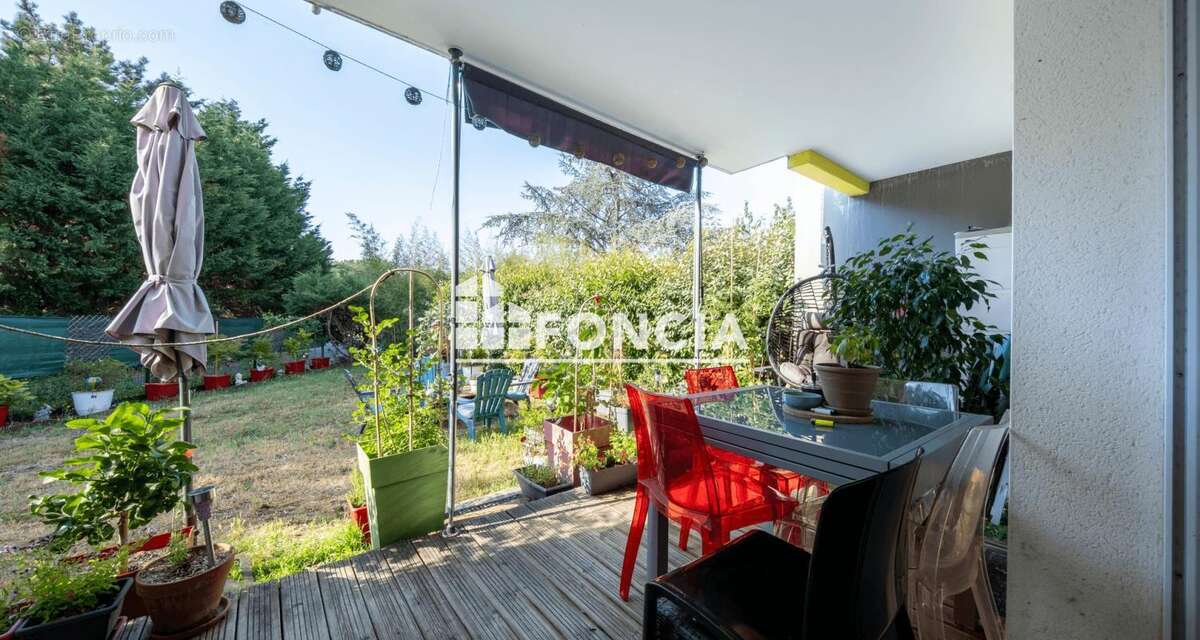 Appartement T2 en RDJ avec parking - photo 3