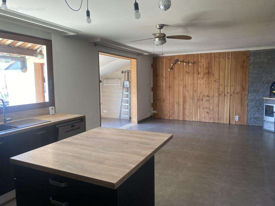 Maison 100 m² à Saint-Hilaire-De-Brethmas  - photo 4