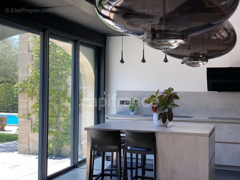 À SAINT MAXIMIN (30) Splendide propriété de 280 m², à 5 min d’Uzès proche de toutes commodités, sur un terrain clos et arboré d’ - photo 14