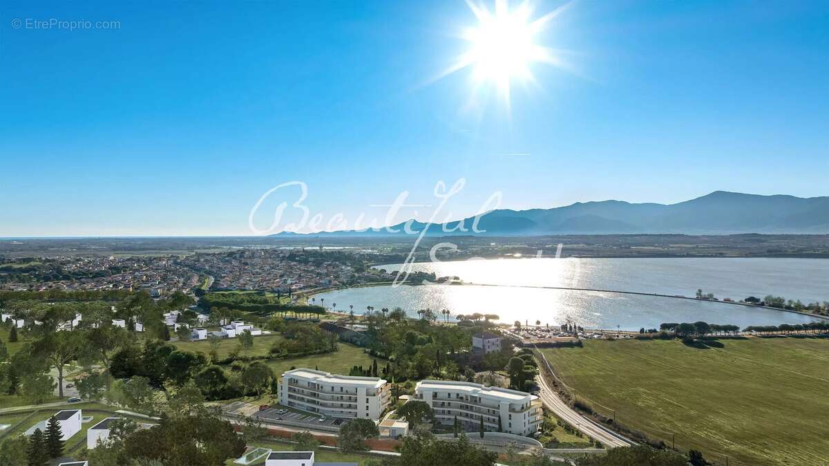 Appartement t3 avec parking et exterieurs, lac villeneuve de la raho - photo 2