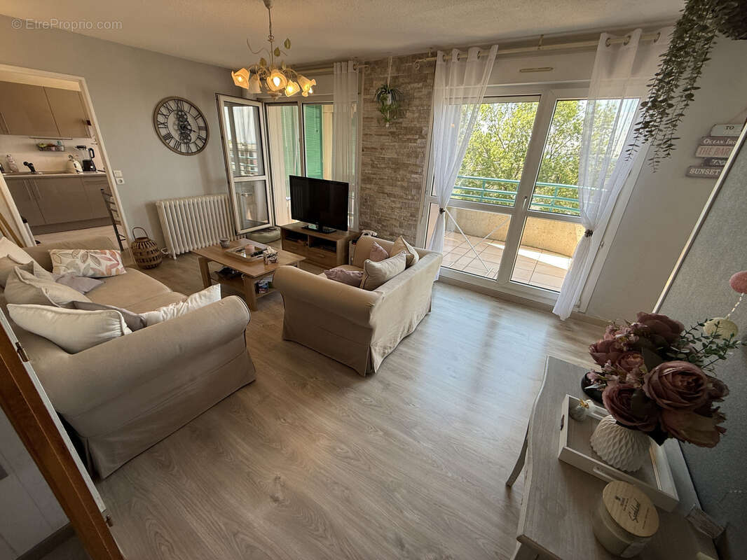 Appartement 5 pièces de 82,20 m2 avec une petite véranda, un balcon et un garage - photo 4