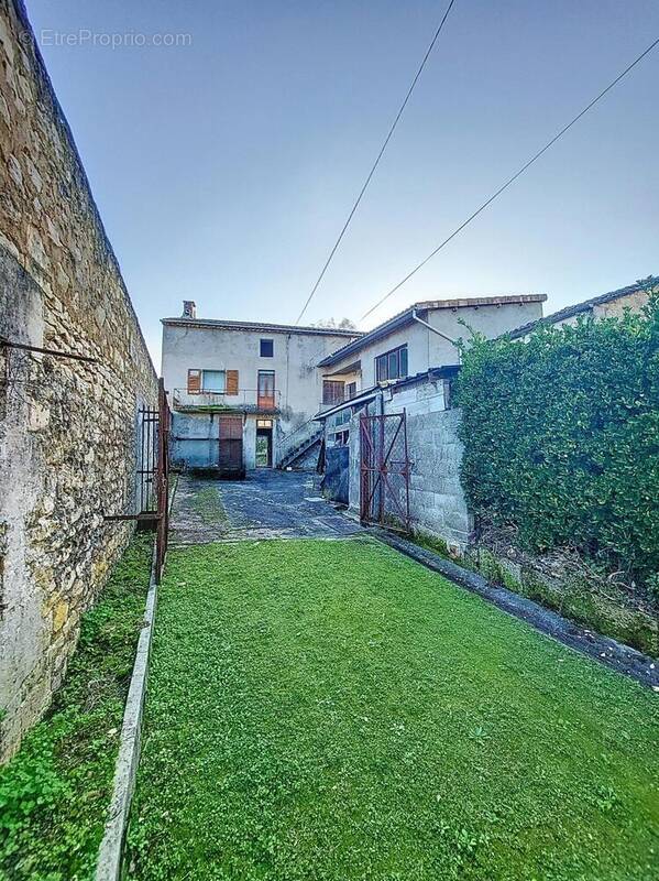 Photo 1 - Maison à TOUVRE