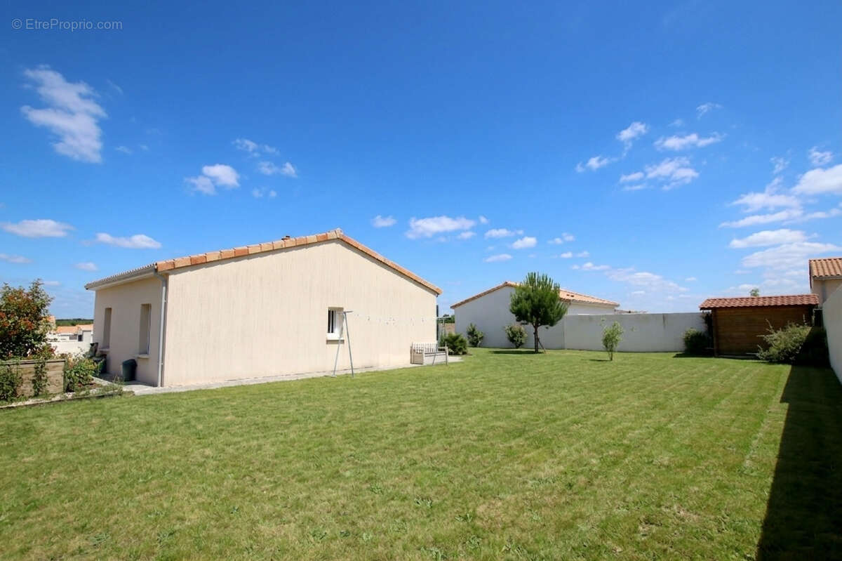 Maison de plain-pied à Vouillé - photo 4