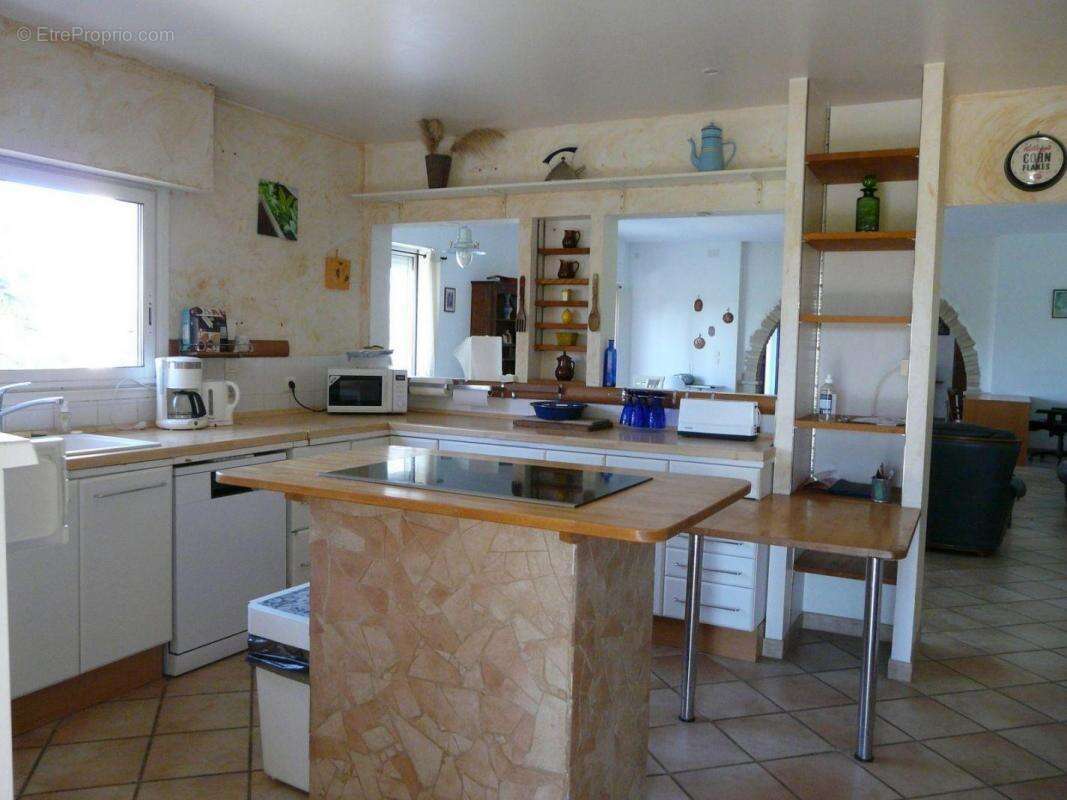 Maison à CASTELNAU-MONTRATIER