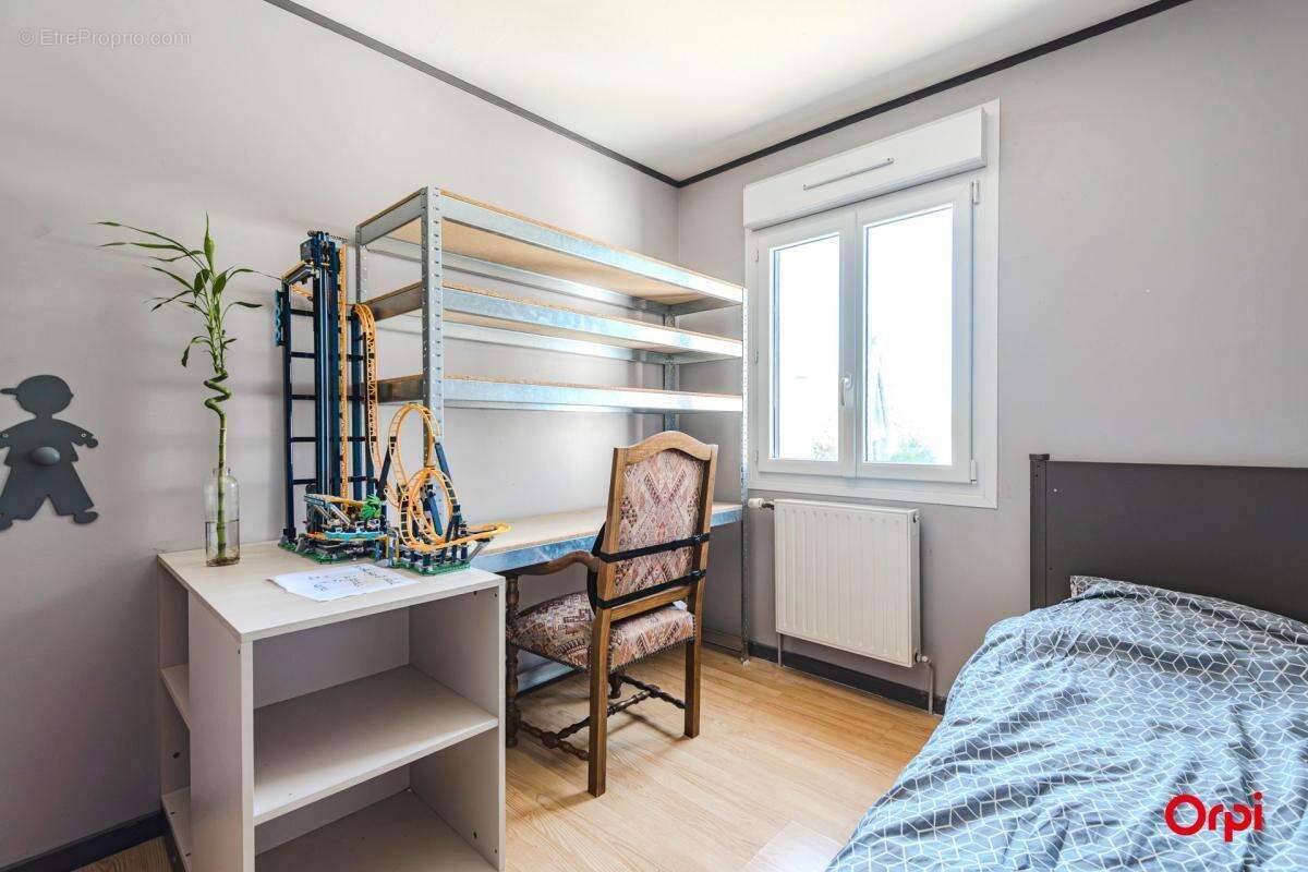 Maison de Plain Pied à Vendre avec Jardin, terrasse et Garage en sous-sol - photo 4