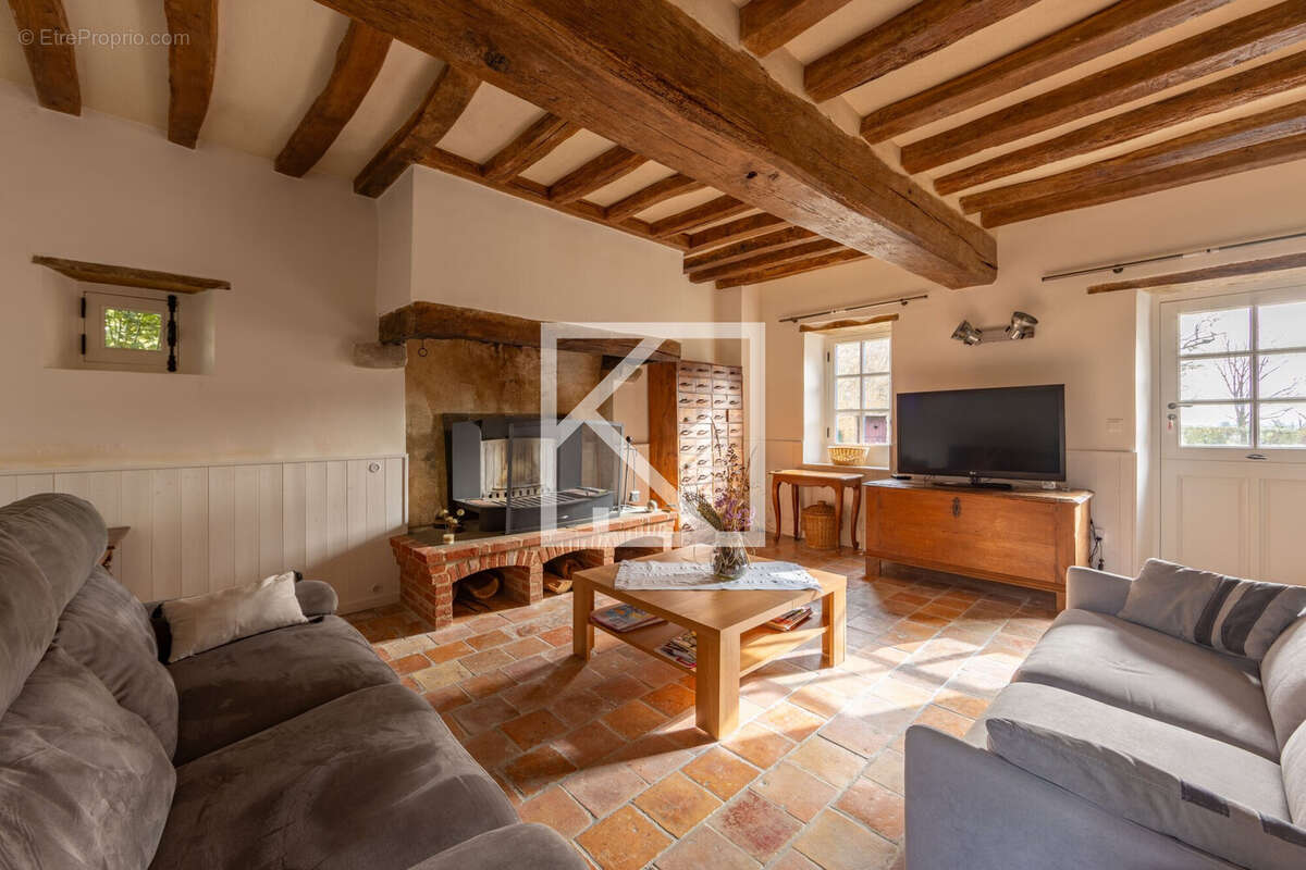 Maison à CHEVILLE