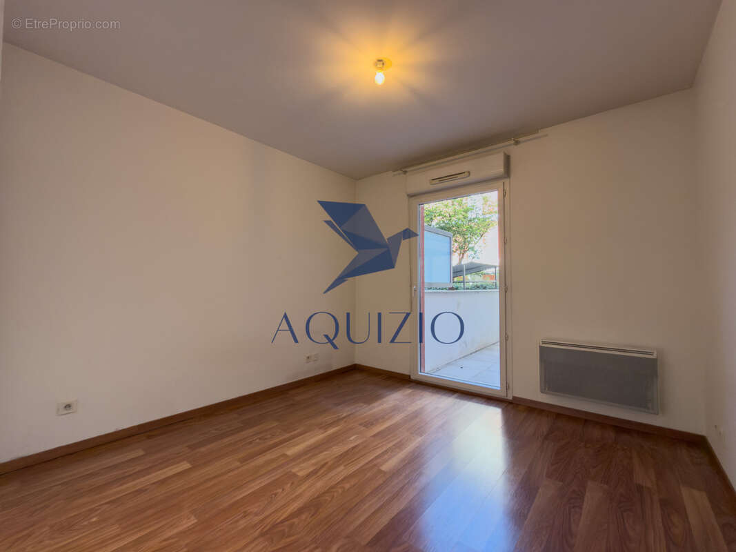 Appartement T3 en rez de jardin avec grande terrasse - photo 13