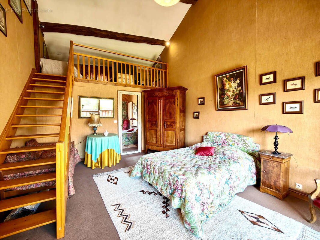 Maison à VILLIEU-LOYES-MOLLON