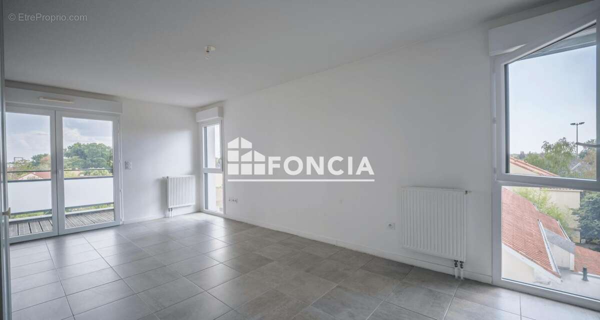 EXCLUSIVITE FONCIA quartier NANTES SUD / BOURDONNIERES : bel appartement T3 récent avec balcon, stationnement couvert, à proximi - photo 4