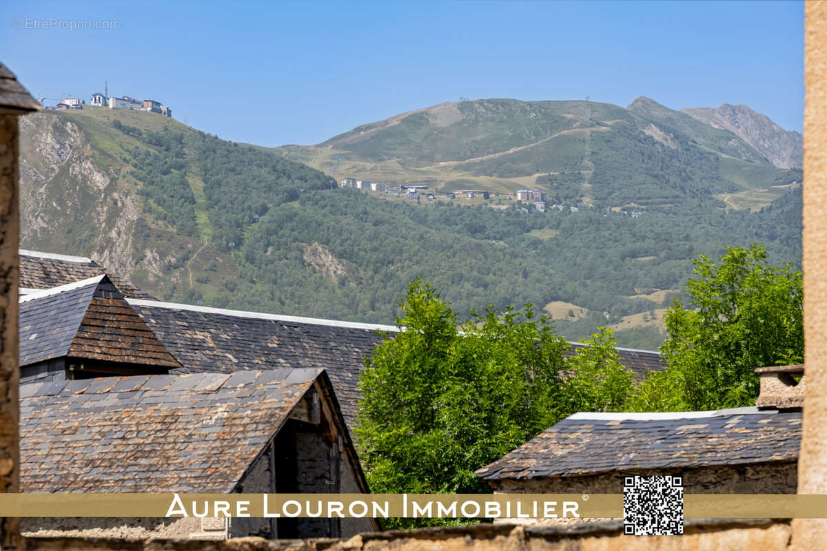 Immeuble de rapport avec 3 appartements 159m2 dans le centre-bourg de bourisp. - photo 5